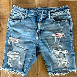 American Eagle men’s shorts with tears and intentional patches. Size 32W.